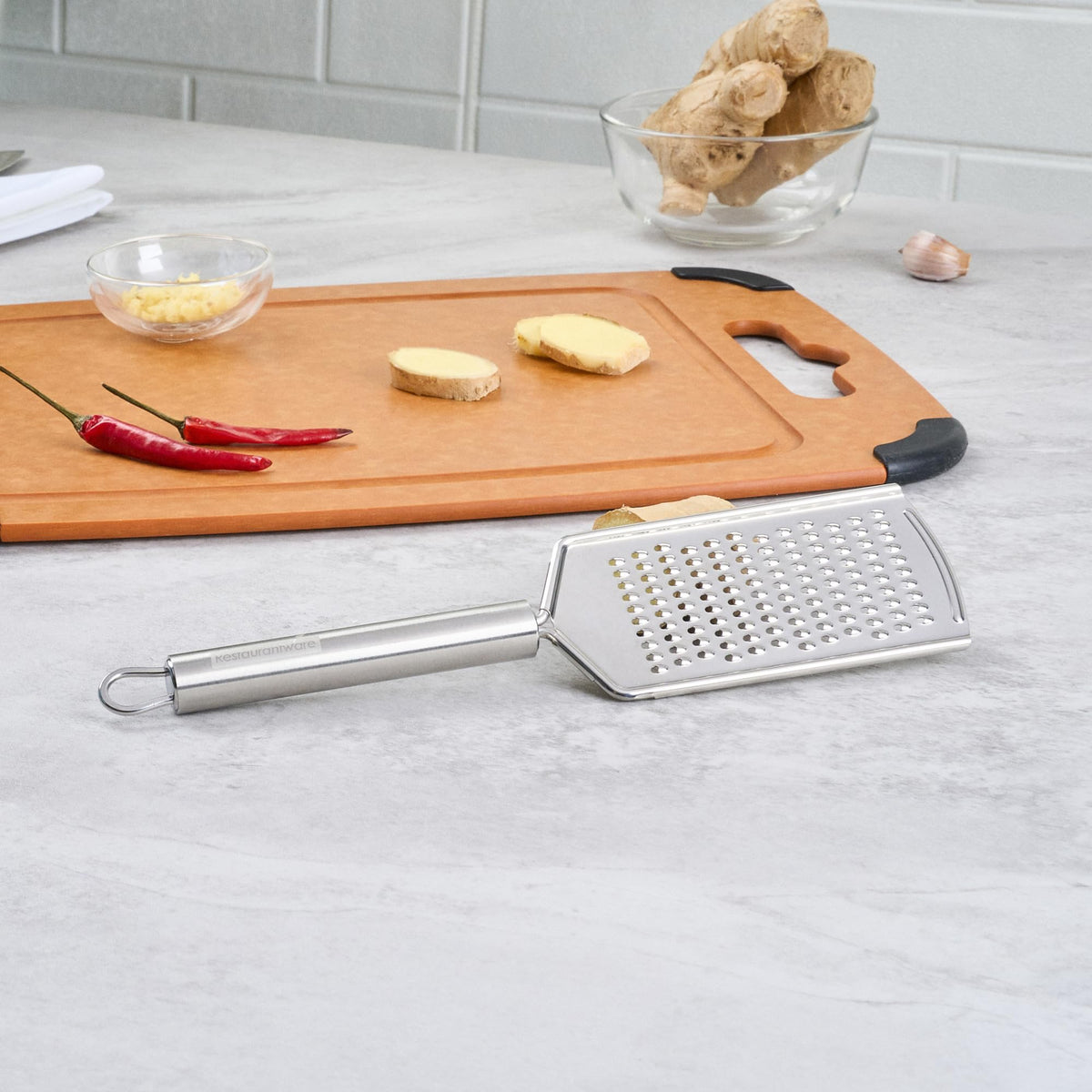 Restaurantware Stainless Steel Fine Cheese Grater - German Standard Lemon Zester with Ergonomic Handle, Sharp Blades, Dishwasher Safe - Handheld Kitchen Grater for Parmesan, Garlic, Ginger