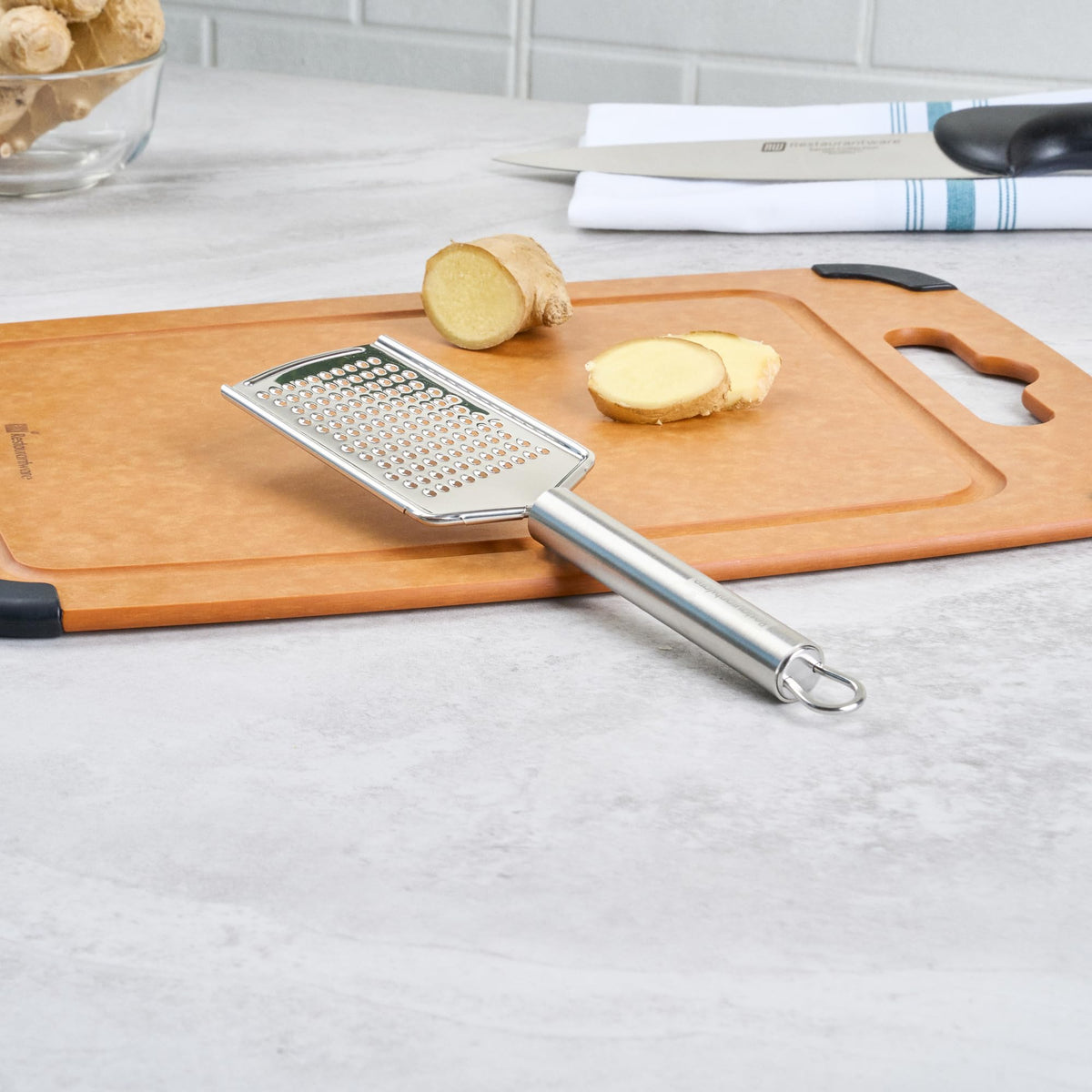 Restaurantware Stainless Steel Fine Cheese Grater - German Standard Lemon Zester with Ergonomic Handle, Sharp Blades, Dishwasher Safe - Handheld Kitchen Grater for Parmesan, Garlic, Ginger