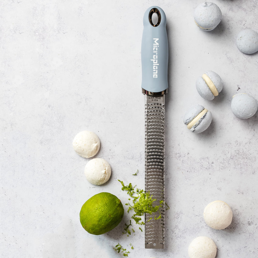 Microplane Zester Grater in Sky Blue for Citrus Fruits, Hard Cheese, Ginger, Chocolate and Nutmeg with Fine Stainless Steel Blade - Made in USA