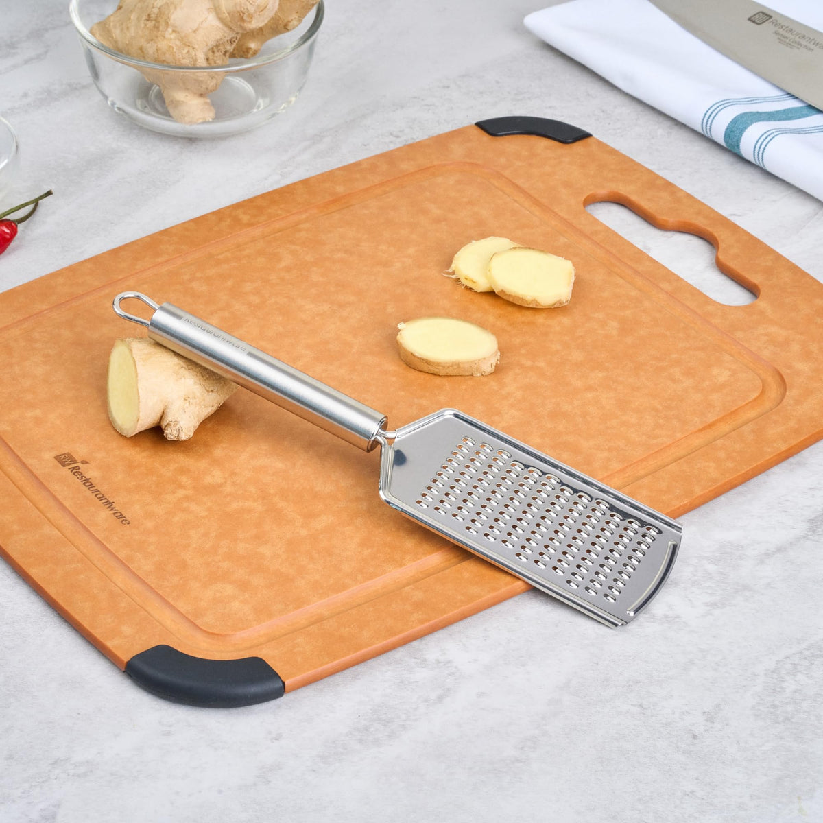 Restaurantware Stainless Steel Fine Cheese Grater - German Standard Lemon Zester with Ergonomic Handle, Sharp Blades, Dishwasher Safe - Handheld Kitchen Grater for Parmesan, Garlic, Ginger